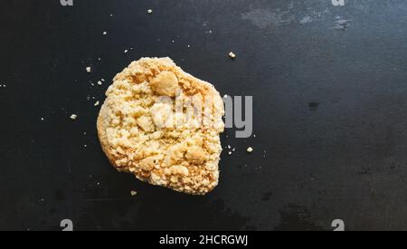 streusel bun or roll on old table, with copy space for individual text Stock Photo