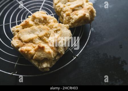 streusel buns or rolls on old table bakery grid Stock Photo
