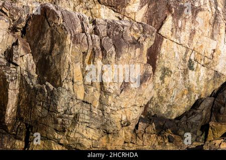 Weathered rock textured background. Slate beige grey Stock Photo