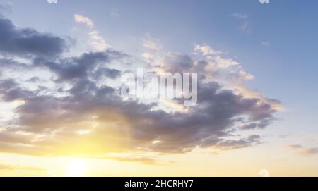 sunset clouds with sun setting down Stock Photo