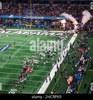 Arlington, Texas, USA. 31st Dec, 2021. The Cincinnatti Bearcats entering the field (Credit Image: © Hoss McBain/ZUMA Press Wire) Credit: ZUMA Press, Inc./Alamy Live News Stock Photo