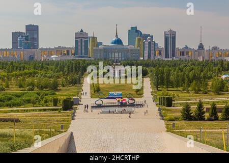 ASTANA, KAZAKHSTAN - JULY 9, 2018: Government buildings behind the Presidential Park in Astana now Nur-Sultan , capital of Kazakhstan. Stock Photo