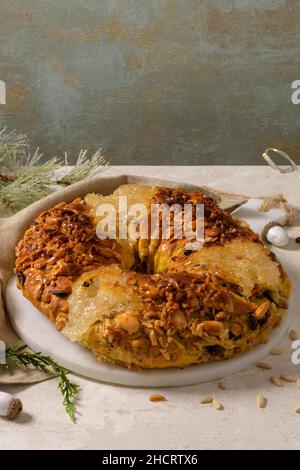 https://l450v.alamy.com/450v/2hcrtx6/bolo-rainha-or-queens-cake-made-for-christmas-carnavale-or-mardi-gras-with-present-wrapping-in-background-2hcrtx6.jpg