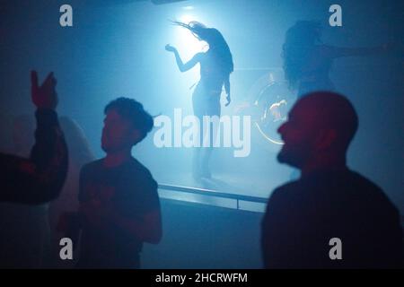 Revellers at Players Bar in Birmingham during New Year's Eve celebrations. Picture date: Friday December 31, 2021. Stock Photo