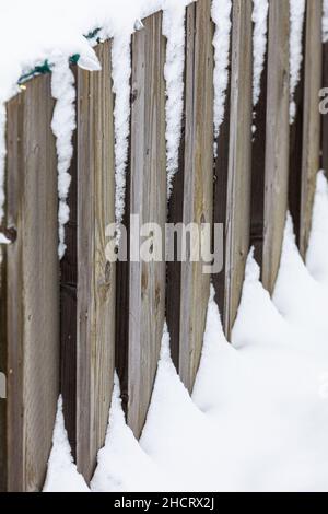 Abstract image of a wooden flood control barrier with snow in Steveston British Columbia Canada Stock Photo