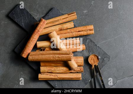 Group of Cinnamon Sticks also known as quills are dried strips of bark from the cinnamon tree. Stock Photo