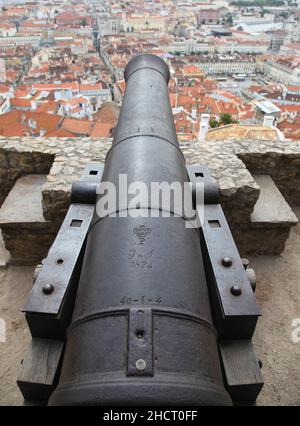 View from atop a historic cannon in Lisbon - Lisboa.  Jardim Júlio de Castilho. Castle of St George Lisbon is the captial city of Portugal, Stock Photo