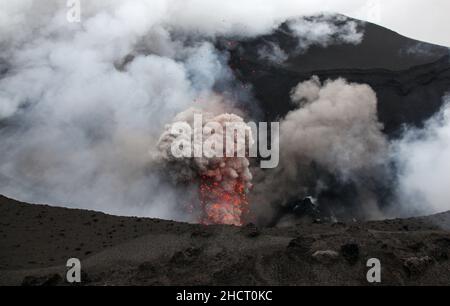 Eruption at Mount Yasur on Tanna Island Vanuatu - This volcano is one of the most accessible vocanos that tourists can visit. Stock Photo