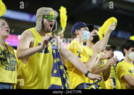 Florida, USA. 31st Dec, 2021. December 31, 2021: Michigan fans cheer during the 88th Capital One Orange Bowl at Hard Rock Stadium in Miami Gardens, Florida (Credit Image: © Cory Knowlton/ZUMA Press Wire) Credit: ZUMA Press, Inc./Alamy Live News Stock Photo