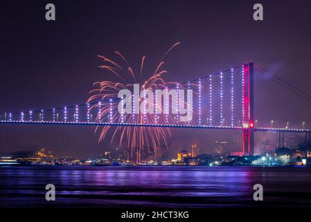 ISTANBUL, TURKEY. New Year 2022 Celebrations Around the Istanbul. Fireworks with Istanbul Bosphorus Bridge (15th July Martyrs Bridge). Stock Photo