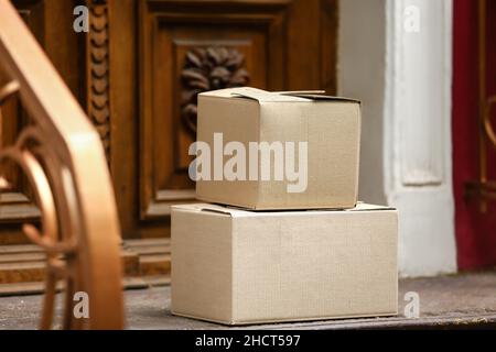 Delivered parcels left on porch outdoors Stock Photo