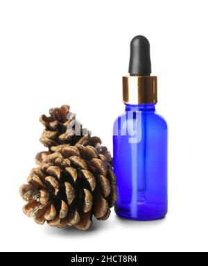 Bottle of essential oil and pine cones isolated on white background Stock Photo