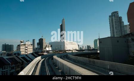 BTS Skytrain Gold Line from Krung Thon Buri to Khlong San Thonburi Bangkok Thailand Trackside View Stock Photo