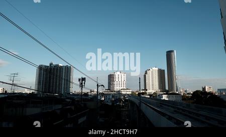 BTS Skytrain Gold Line from Krung Thon Buri to Khlong San Thonburi Bangkok Thailand Trackside View Stock Photo