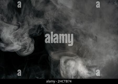 Smoke isolated on black background Stock Photo