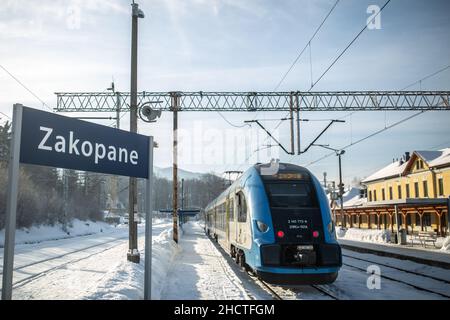 Zakopane, Poland - December 28, 2021: Train at Zakopane train station on December 28, 2021. Stock Photo