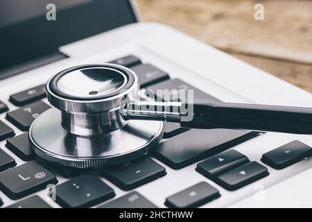 Stethoscope on a notebook - Virus alert concept image Stock Photo