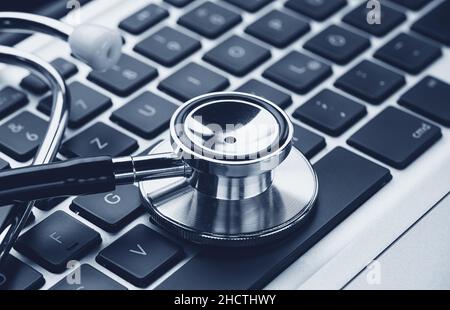 Stethoscope over a laptop keyboard - cybercrime concept image Stock Photo