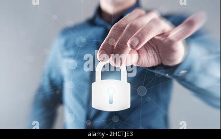 Businessman holding digital padlock to the secure Stock Photo