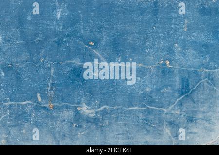 cracked blue concrete wall covered with  cement surface as background Stock Photo