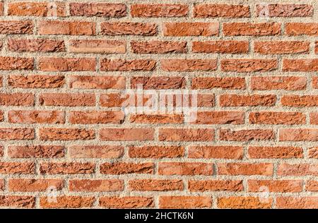 Old brick wall, old texture of red stone blocks Stock Photo