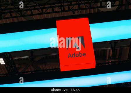 Adobe Systems Logo. Adobe is a multinational software company that produces and sells multimedia and creativity software. Stock Photo