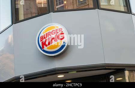 Burger King sign on a store. Burger King, often abbreviated as BK, is a global chain of hamburger fast food restaurants,United States. Stock Photo