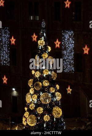 A christmas tree and decorations on a street in the old city of Jerusalem, Israel. Stock Photo