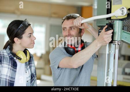 young attractive student of mechatronics working on project Stock Photo