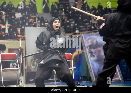 Tehran, Iran. 01st Jan, 2022. A woman shows her martial arts during the gathering of Qasem Soleimani's supporters. the Iranian former Islamic Revolutionary Guard Corps (IRGC) Quds Force General Qasem Soleimani was killed in an American drone attack in Baghdad airport. (Photo by Sobhan Farajvan/Pacific Press) Credit: Pacific Press Media Production Corp./Alamy Live News Stock Photo