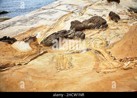 View of ancient rock formations at the Yehliu Geological park. Stock Photo