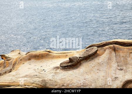 View of ancient rock formations at the Yehliu Geological park. Stock Photo