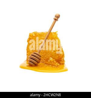 Honeycomb with honey spoon isolated on white background Stock Photo