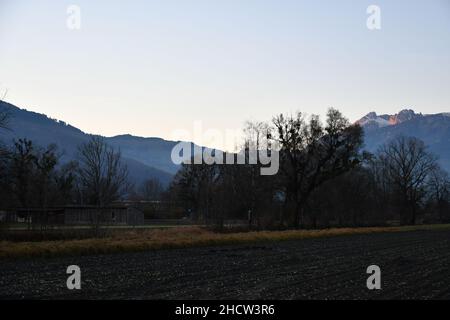 Vaduz, Liechtenstein, November 19, 2021 Natural scenery with an agriculture place in the alps Stock Photo