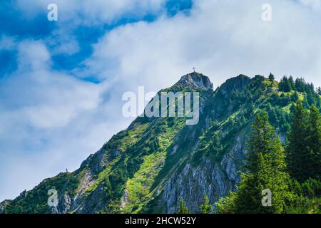 Germany, Tegelberg mountain summit in bavarian allgaeu nature landscape an adventurous hike to the top Stock Photo