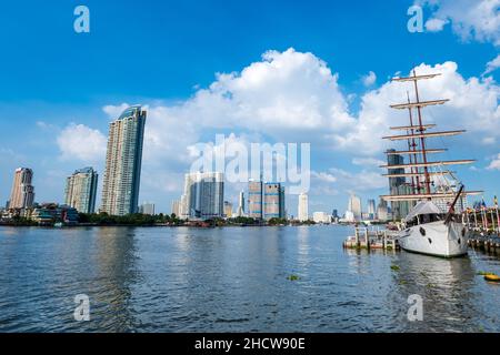 Bangkok, Thailand - December 2021: Chao Phraya River view and Bangkok skyline in Thailand. Downtown skyline and river cityscape Stock Photo