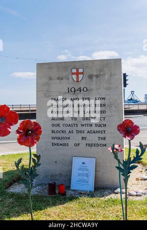 Inscribed Second World War memorial, coastal defences on Eastney Esplanade promenade in Southsea, Portsmouth, Hampshire, south coast England Stock Photo