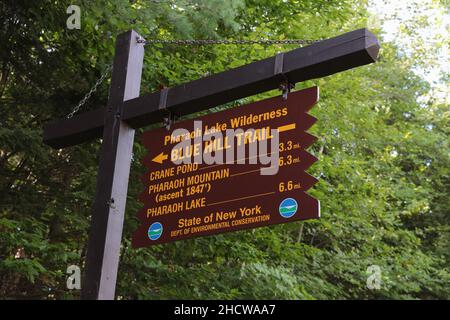 Pharaoh Lake Wilderness Blue Hill Trail sign in the Adirondack Mountain region of New York state, USA Stock Photo