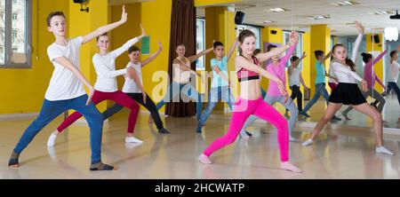 Teenagers practicing dance in studio Stock Photo