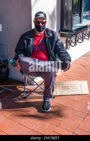 A beggar with death in family Stock Photo