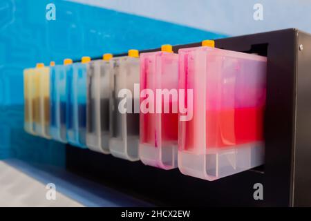 Row of inkjet printer CMYK cartridges - close up Stock Photo