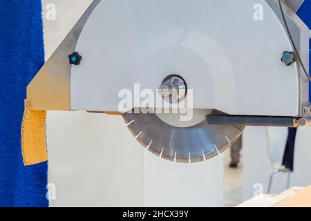 Automatic cnc bridge saw - router profiling system cutting artificial stone Stock Photo