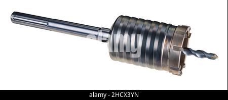 Hole saw with pilot drill bit isolated on white background. Sharp drilling cutter with diamond teeth crown and SDS shank. Metal tool to sawing masonry Stock Photo