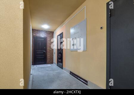 long empty corridor in interior of entrance hall of modern apartments, office or clinic Stock Photo