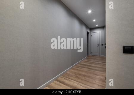 long empty corridor in interior of entrance hall of modern apartments, office or clinic Stock Photo