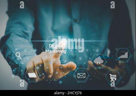 Man hand touching virtual icon business digital marketing. modern Internet technology metaverse, Social Networking, big data online marketing, digital Stock Photo