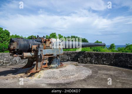 An historic World War 2 gun emplacement overlooking Flying Fish Cove on Christmas Island. Stock Photo