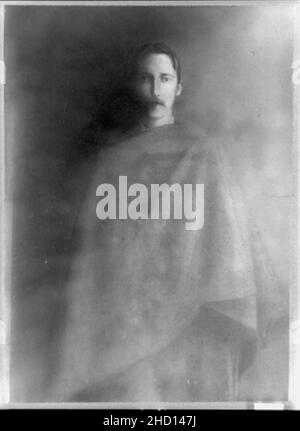 Robert Louis Stevenson, three-quarter length portrait, facing front, draped with cloth Stock Photo