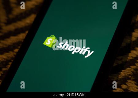 Shopify ecommerce business platform, Shopify application on smartphone, online e-commerce website making software, digital business growing platform Stock Photo
