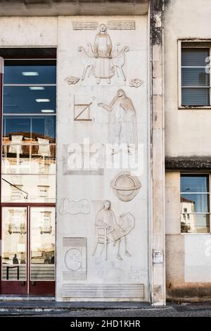 Bas-relief on the facade of the Departamento de Matemática (Department of Mathematics) at the University of Coimbra, Portugal, opened in 1969 Stock Photo